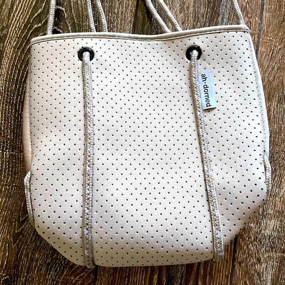 NWOT ah•dorned Neoprene perforated shoulder tan bag - Picture 2 of 16